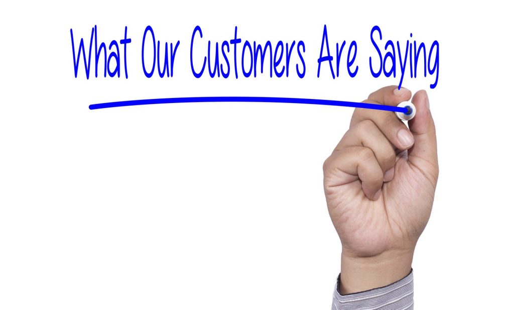 Business concept Hand writing What Our Customers Are Saying on v