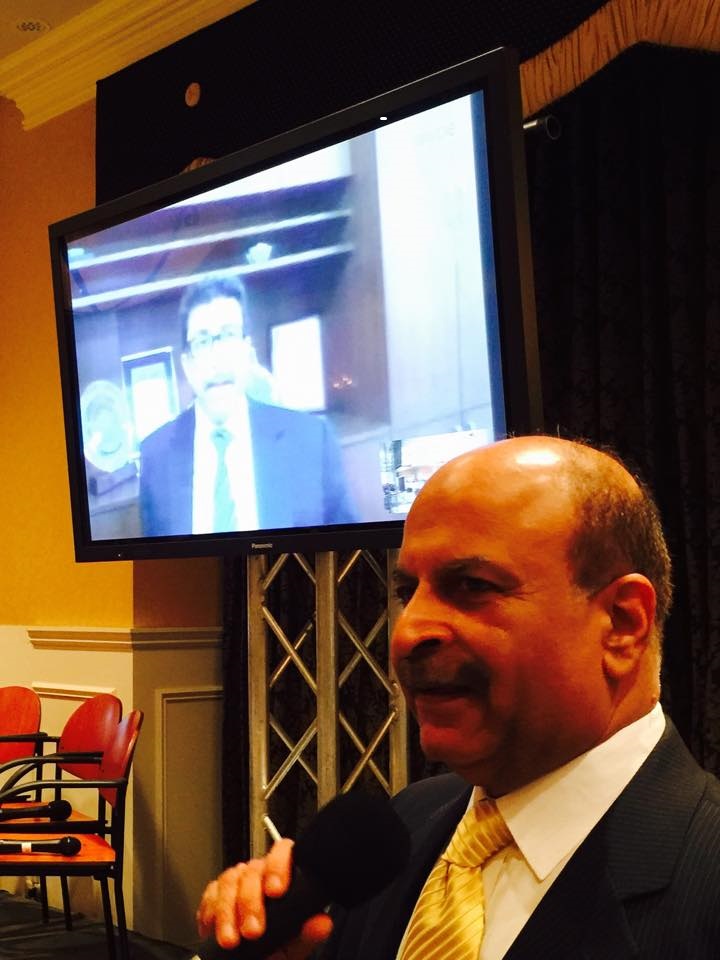 Farook Mahmood of the Silverline Group in India, seen in a live digital feed, discusses the navigation of foreign markets with Raj Rajpal of Wells Fargo Home Mortgage during SIBOR’s 2015 Global Real Estate Summit on Staten Island. (Photo by Relevant Public Relations LLC)